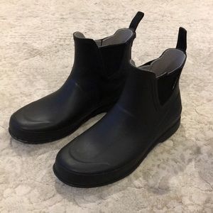 Black Rain Boots with faux fur lined boot socks.
